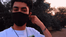 Taking Out Face Mask Giovanni Rivera GIF - Taking Out Face Mask Giovanni Rivera Gio And Eli GIFs