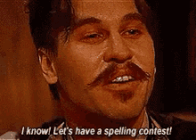 Doc Holliday Spelling Contest GIF - Doc Holliday Spelling Contest Tombstone GIFs