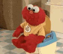 Elmo Poop GIF - Elmo Poop Sitting GIFs
