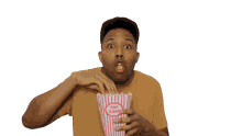 black prez eating popcorn movie cinema suspense