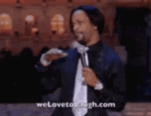 We Love To Laugh Stand Up Comedian GIF - We Love To Laugh Stand Up Comedian Performance GIFs