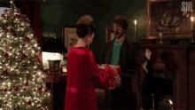 Opening The Gift Surprise GIF - Opening The Gift Surprise Open The Box GIFs