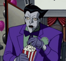 Joker Eating Popcorn GIF - Joker Eating Popcorn Nom GIFs