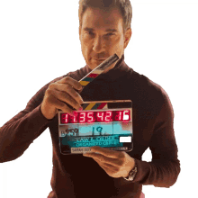 dun dun dylan mcdermott law and order clapperboard lights camera action board