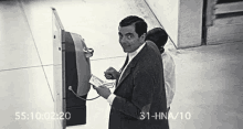 Mr Bean Rowan Atkinson GIF - Mr Bean Rowan Atkinson Security Camera GIFs