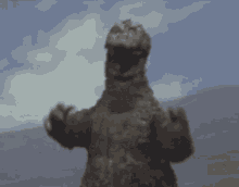 Godzilla Hug GIF - Godzilla Hug GIFs