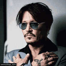 johnny depp deauville2019 photoshoot pose glasses