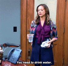 Parks And Rec Ann Perkins GIF - Parks And Rec Ann Perkins You Need To Drink Water GIFs