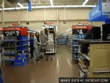 Moonwalking In Walmart GIF - Walmart Wallyworld Shoppingcart GIFs