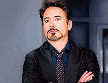 Robert Downey Jr Tony Stark GIF - Robert Downey Jr Tony Stark Eye Roll GIFs