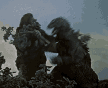 Godzilla Vs Kong Fight GIF - Godzilla Vs Kong Fight Eat This GIFs