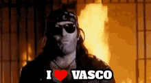 Vasco Rossi Cantante Canzone Video Fuoco Occhiali Da Sole Bandana GIF - I Love Vasco Rossi Italian Singer Music Video GIFs