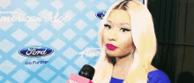 Smug Nicki Minaj GIF - Smug Nicki Minaj Shrug GIFs