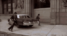 Pay Respects Bluesmobile GIF - Pay Respects Bluesmobile Blues Brothers GIFs