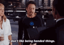 I Dont Like Being Handed Things Tony Stark GIF - I Dont Like Being Handed Things Tony Stark Iron Man GIFs
