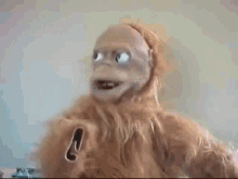 Lucy The Robot Orangutan GIF - Lucy The Robot Orangutan Puppet GIFs