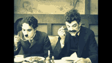 charles charlie chaplin eating ouch hot