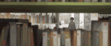 Library Books GIF - Library Books Book Shelves GIFs