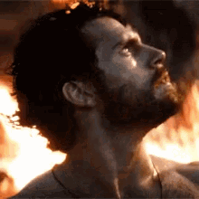 henry cavill man of steel look up flames