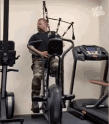 Playing Bagpipes On Exercise Bike While Playing Bagpipes GIF - Playing Bagpipes On Exercise Bike Exercise While Playing Bagpipes GIFs