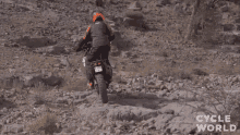 uphill stunt pro rider riding motocross