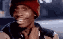 Scratch Neck Smile GIF - Scratch Neck Smile Dave Chappelle GIFs