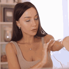 Rubbing Skin Coco Lili GIF - Rubbing Skin Coco Lili Applying Make Up GIFs