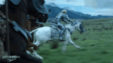 riding a horse galadriel morfydd clark lord of the rings ring of power im on my way