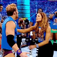 Eve Torres Low Blow GIF - Eve Torres Low Blow Zack Ryder GIFs