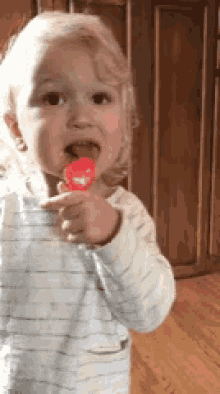 Lick Lollipop GIF - Lick Lollipop Cute Baby GIFs