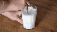 Stirring Milk GIF - Stirring Milk Stir Milk GIFs