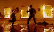 Lateef Crowder Vs Tony Jaa GIF - Fire Stunt Martial Arts GIFs