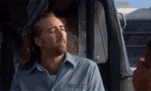 Nicolas Cage Feeling Fabulous From The Wind GIF - Wind In Hair Fabulous Wind Nicolas Cage GIFs