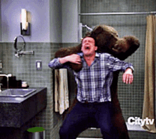 Marshall And The Bear How I Met Your Mother GIF - Marshall And The Bear How I Met Your Mother Marshall Eriksen GIFs