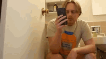 sleepy drowsy bathroom toilet phone addiction