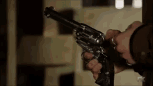 Justified Gun Spinning GIF - Justified Gun Spinning Revolver GIFs