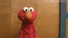 Elmo Se Encoge De Hombros Y Pregunta ¿qué Hago? GIF - Elmo Que Hago Shrug GIFs