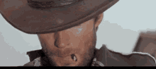 Clint Eastwood Laughing GIF - Clint Eastwood Laughing A Fistful Of Dollars GIFs