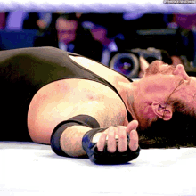 The Undertaker Laying Down GIF - The Undertaker Laying Down Tired GIFs