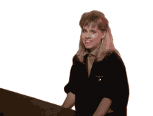 playing piano the go gos head bop jamming out smiling