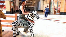 Becky Lynch Riding GIF - Becky Lynch Riding Zebra GIFs