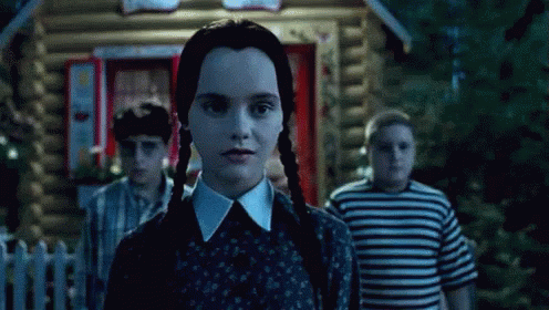 Trying To Smile - Addams Family Values GIF - Addamsfamilyvalues  Addamsfamily Smile - Discover &amp; Share GIFs
