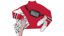 sweater red sweater prints outfit ways to wear a fanny pack