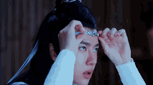 Wang Yibo Fix Headband GIF - Wang Yibo Fix Headband Lan Zhan GIFs