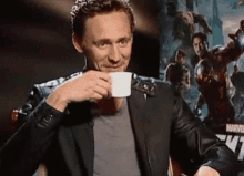 Tom Hiddleston Sips Drink GIF - Tom Hiddleston Sips Drink Drink GIFs