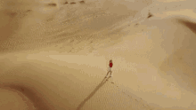 arms raised feeling it top view desert footprints arms raised feeling it top view desert footprints