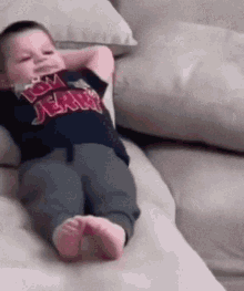 Lil Kid Chilling Chilling On Couch GIF - Lil Kid Chilling Chilling On Couch Little Kid Chilling On The Couch GIFs