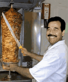 saddam hussein adobada meat cutters smile shawarma