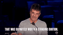 That Was Definitely Worth A Standing Ovation Simon Cowell GIF - That Was Definitely Worth A Standing Ovation Simon Cowell Americas Got Talent GIFs