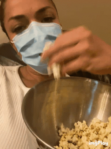 Mask Eating GIF - Mask Eating Popcorn - Discover &amp; Share GIFs